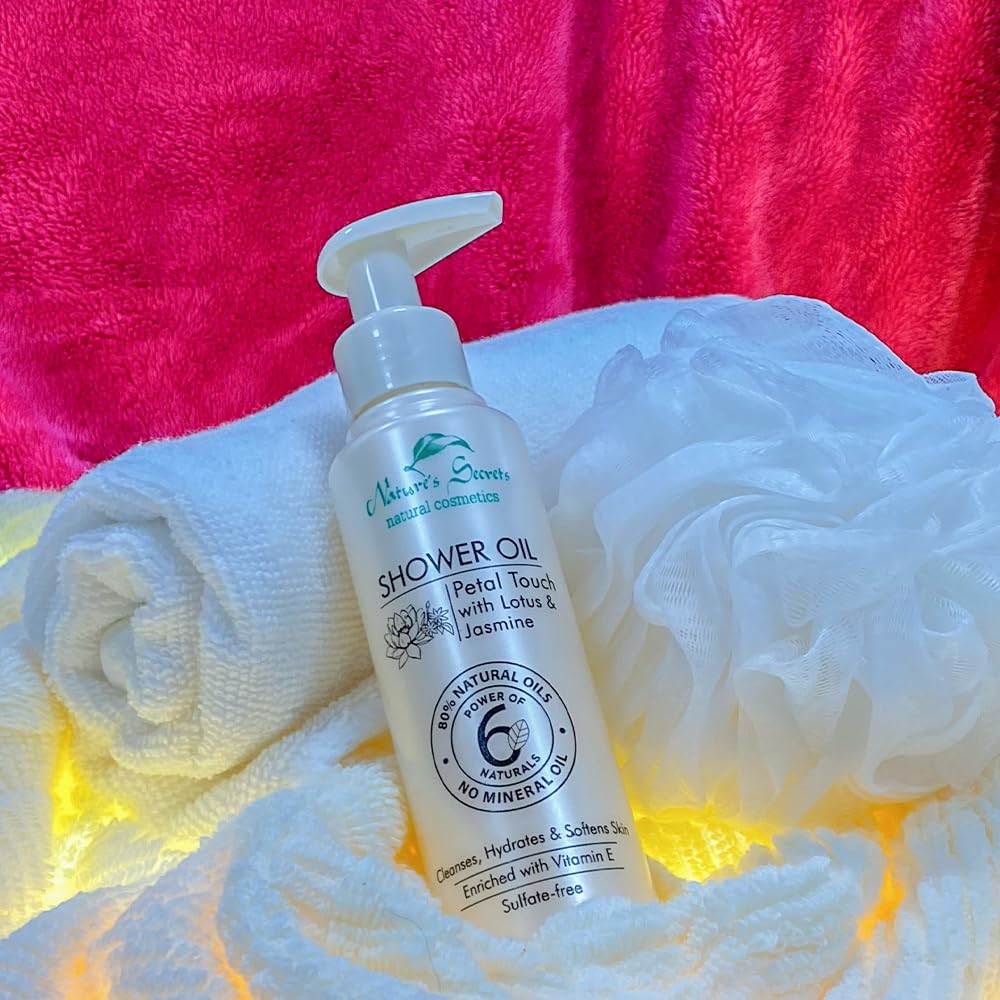 Sweet Almond Cleansing & Softening Shower Oil. Oil-to-Milky Lather. Sulfate-Free. With Jasmine & Lotus. No Mineral Oil. For Dry & Extra Dry Skin. For Softer, Smoother & Nourished Skin.